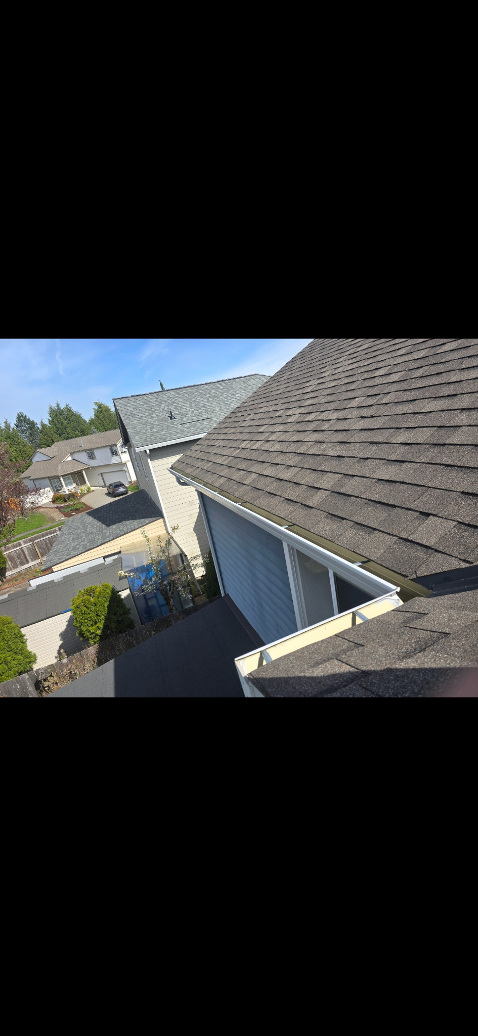 Matching long gutter face visibly whiter and cleaner.